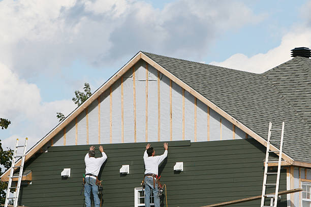 Professional Siding Installation technician working in Waverly, VA